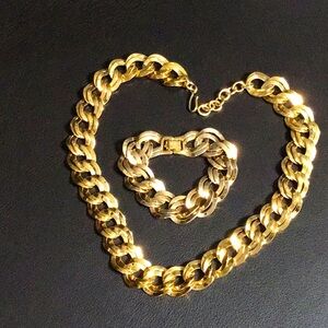 Monet gold tone flat curb chain necklace with matching bracelet.
